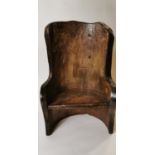 19th. C. child's pine dugout chair.