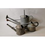 Three 19th. C. galvanised watering cans.