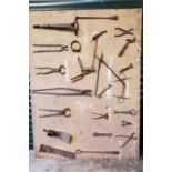 Early 19th. C. display board of Carpenter's tools etc,