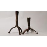 Two wrought iron candleholders. (20cm H).