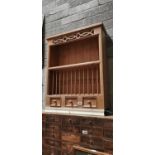 Pine hanging plate rack.