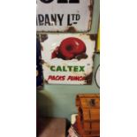 Rare Original enamel Caltex Packs Punch advertisement.