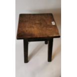 19th. C. elm and oak stool with four legs. (35 cm H)
