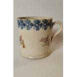 19th. C. spongeware mug decorated with birds and flowers.