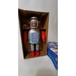 Wind up Friction powered Astro Scout robot toy .