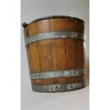 19th. C. oak bucket with metal straps. (32 cm H )