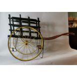 19th. C. painted pine child's cart with metal wheels.