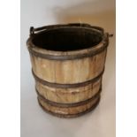 19th. C. bucket with metal hoops. (31 cm H).