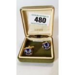 Pair of gold plated cuff links by Sophos England with SAS emblems.