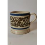 19th. C. spongeware mug decorated with birds.