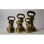 Set of six brass 19th. C. butcher's weights.