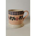19th. C. lusterware mug with floral decoration.