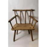 Early 19th. C. ash and elm hedge chair originally from Co Cavan.