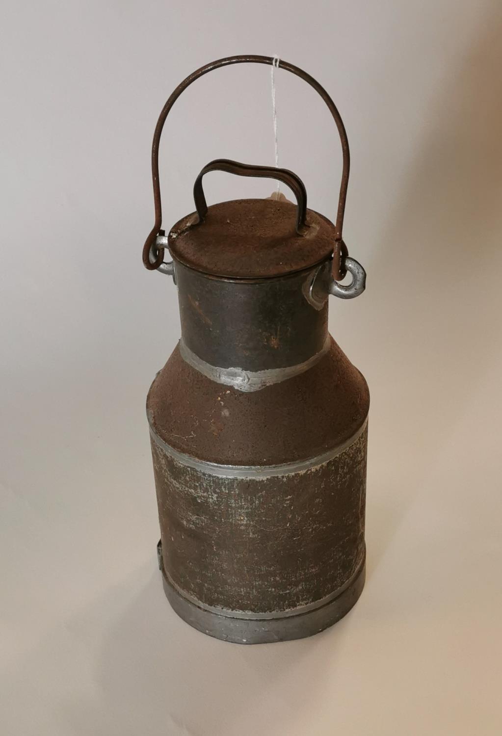 Late 19th. C. tin plate churn.