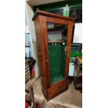 Edwardian pine cabinet with single glazed door.