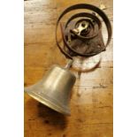 19th. C. brass and metal wall bell with bracket.