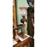 Brass corinthian column oil lamp.