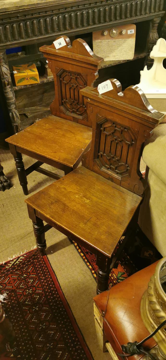 Pair of 19th. C. oak hall chairs.