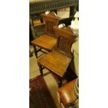 Pair of 19th. C. oak hall chairs.