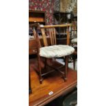 Edwardian open arm chair.