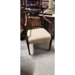 19th C. mahogany open arm chair.