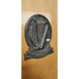 Cast iron Eire Harp.