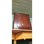 Mahogany corner cupboard.