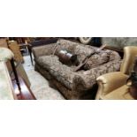 Three seater upholstered sofa.