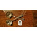 Pair of English silver sauce ladles.