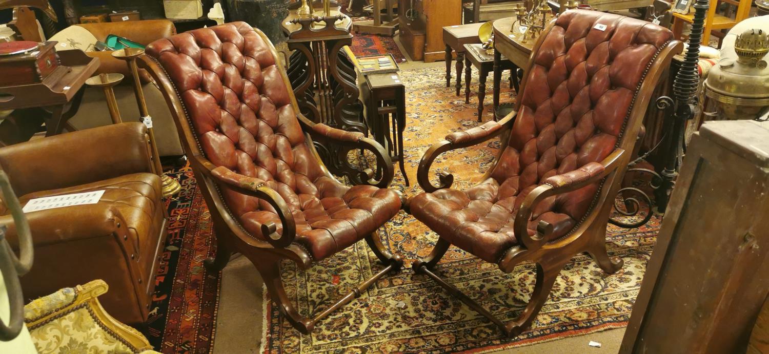 Pair of leather and mahogany library chairs.