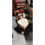 Pair of early 19th C. inlaid mahogany side chairs.