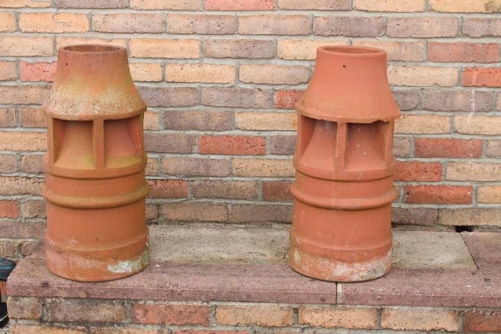 Pair of terracotta chimney pots.