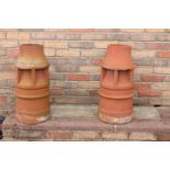 Pair of terracotta chimney pots.