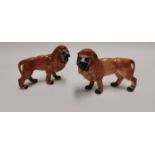 Pair of 19th C. Staffordshire lions.