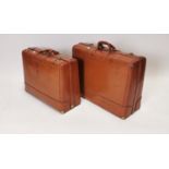 Pair of 1960s leather suitcases.
