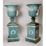 Rare pair of early 19th. C. cast iron garden urns.