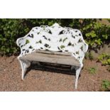 Decorative aluminium and wood fern design garden seat.