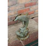 Cast iron door stop in the form of a Dolphin.