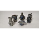 Collection of stoneware pottery.