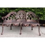 Decorative aluminium bronzed three seater garden bench.
