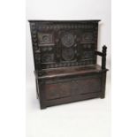 18th C. carved oak monks bench.