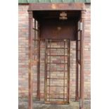 Cast iron telephone box.