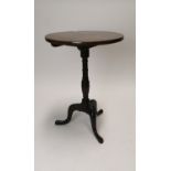 Georgian mahogany wine table on turned columns and three outswept legs. (71 cm h x 54 cm W).