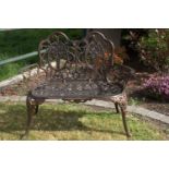 Decorative bronzed cast aluminium two seater garden bench.