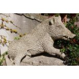 Cast stone model of a Wild Boar raised on plinth.