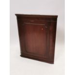 Mahogany corner cupboard.