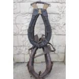 Two leather horse collars and winkers..