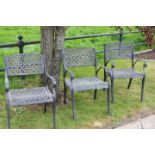Set of three black garden aluminium chairs.
