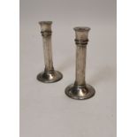 Pair of Edwardian silverplate candlesticks.