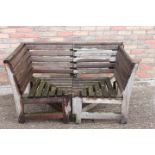 Two piece teak garden seat.